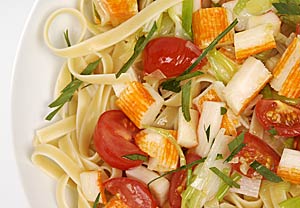 Pasta mit Crabmeat und Tomaten